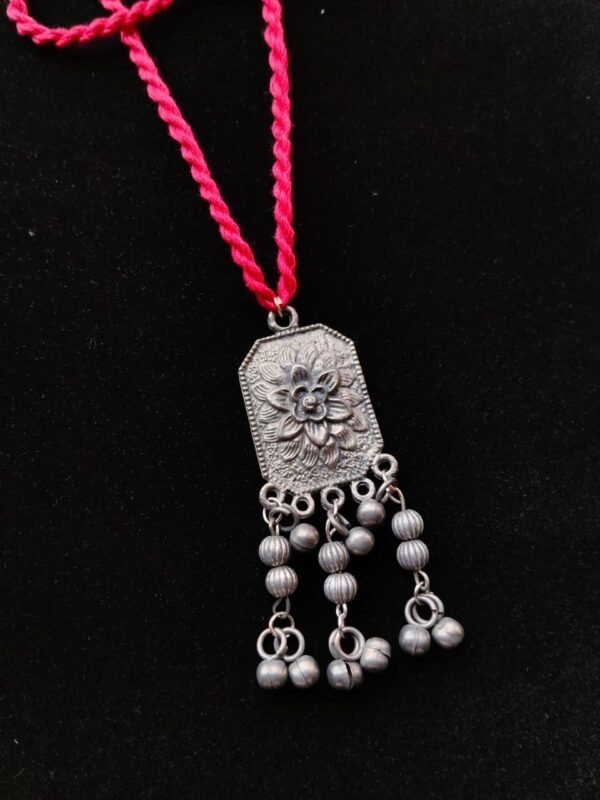 Ethnic Floral Motif Pendant with Metal Dangles
