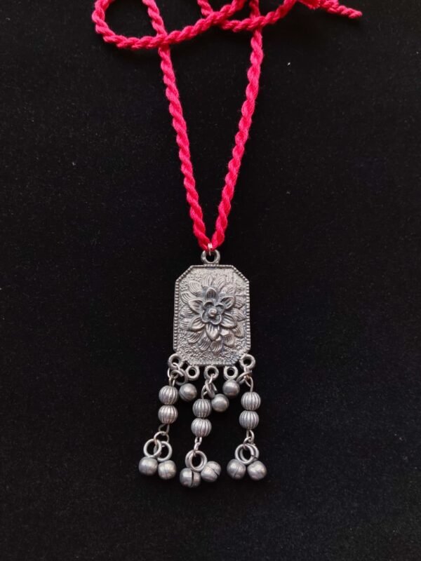 Ethnic Floral Motif Pendant with Metal Dangles